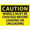 Caution - Wheels Must be Chocked before loading or unloading