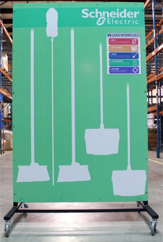 Tool shadow board on a mobile frame designed for Schinder, featuring a solid green background and organized tool shadows for easy tool management. And a call-out of the 5S strategy.