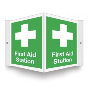 12"x9" green and white 3D projection sign with a 3D image of a white cross and white text stating "First Aid Station."